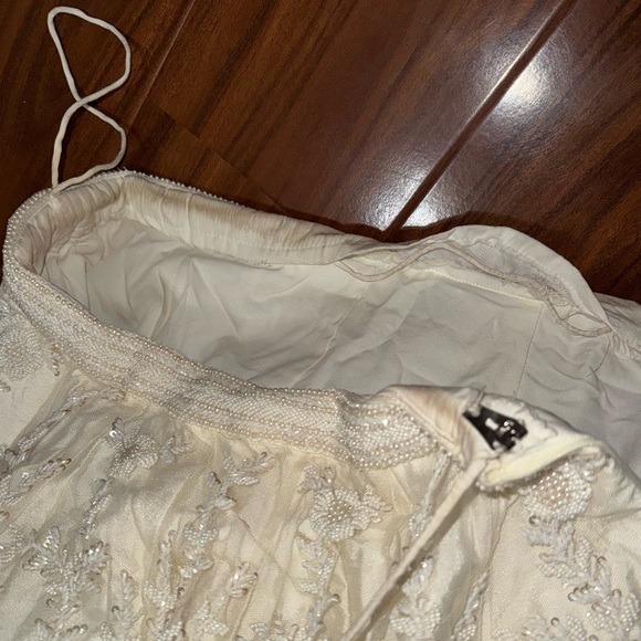 Extravagant Ivory Pearl Lehenga 🤍 - Picture 9 of 11